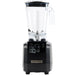 Hamilton Beach HBH650R The Tempest 64 oz commercial blender with empty clear container and black base, front