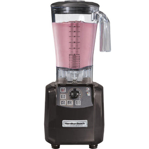Hamilton Beach HBH650R The Tempest 64 oz commercial blender with clear container of pink smoothie, front view