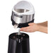 Hamilton Beach HCJ967 electric citrus juicer, hand removing the stainless steel juicing head from the motor base
