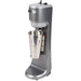 Hamilton Beach HMD200 series single-spindle drink mixer in grey with stainless cup attached, angled right view