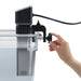 Hamilton Beach HSV1000 AcuVide 1000 immersion circulator clamped to a clear water bath, hand tightening the clamp