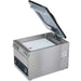 Hamilton Beach HVC254 chamber vacuum sealer with lid open and a white filler plate inside the chamber, angled