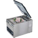 Hamilton Beach HVC254 chamber vacuum sealer with lid open and vacuum-packed chicken inside the chamber