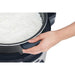 Hamilton Beach 37590 90 cup rice cooker/warmer, hand lifting the non-stick inner pot filled with cooked rice