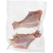 Hamilton Beach smooth in-chamber vacuum bag, clear pouch vacuum sealed around two raw poultry legs