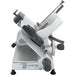 Hobart Centerline EDGE12 manual meat slicer, alternate angled view of the blade guard, carriage tray and gauge knob