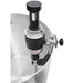 KitchenAid KHBC400 commercial immersion blender clamped to the rim of a stainless steel stock pot