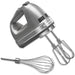 KitchenAid KHM7210CU 7-speed silver hand mixer shown with stainless steel beaters and whisk attachment