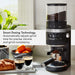 KitchenAid KCG8433BM coffee grinder beside espresso cups, graphic describing smart dosing technology