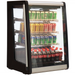 Nordic Air NACP-24T refrigerated display case with black frame shown stocked with canned and bottled drinks