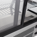 Nordic Air NACP-36 angled glass pastry display case, close-up of the rear sliding doors and wire shelves