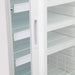 Nordic Air PHR-315L pharmacy refrigerator, close-up of the glass door handle and white wire shelves inside