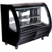 Pro-Kold DDC-60 curved glass 56 inch refrigerated deli case in black finish with two glass shelves, angled view
