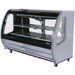 Pro-Kold DDC-80 curved glass 74 inch refrigerated deli case in stainless steel finish with shelves, angled front view