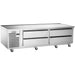 Traulsen TE084HT 84-inch stainless steel refrigerated chef base with four drawers on casters, angled front view