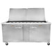 Traulsen UST7218-LR 72-inch sandwich prep table with stainless steel lids raised showing the ingredient pan rail