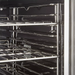 Vulcan Ecomax JGC100-ES natural gas/propane convection oven, close-up of the interior chrome wire racks and rails