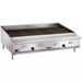 Vulcan VTEC series gas charbroiler, stainless steel countertop unit with cooking grates and legs, angled view