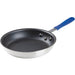 Winco AFPI Series induction non-stick aluminum fry pan with black coated interior and blue handle sleeve, angled