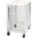 Winco ALRK-10-CV cover for ALRK-10 tier sheet pan rack, clear plastic cover shown fitted over the rack on casters
