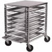 Winco ALRK-15 aluminum welded sheet pan rack, low rack with solid top loaded with sheet pans on four casters