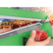 Winco EBS-400M Spectrum 16-inch impulse bag sealer shown in use, sealing a clear bag of food with 3 mm wide seal