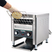 Winco ECT-700 Spectrum electric conveyor toaster shown in use, gloved hand loading bread onto the conveyor rack