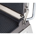 Winco EPG-1C press panini grill, close-up of the ribbed grill plates and the self-balancing upper plate hinge