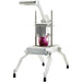 Winco Kattex OS series onion quick slicer with a red onion in the cutting head, aluminum frame on four legs