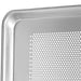 Winco perforated 18 gauge aluminum sheet pan, close-up of the corner and small perforation pattern