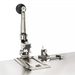 Winco premium manual can opener, close-up of the removable blade and gear head mounted on a steel countertop