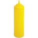 Winco wide-mouth squeeze bottle in yellow plastic, tall size ideal for mustard, with yellow pointed tip cap